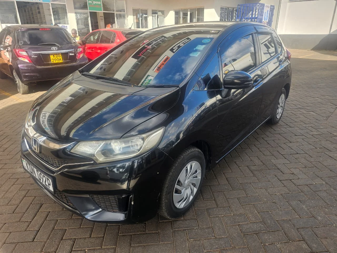 Honda fit New shape  Super clean 😲 QUICK SALE 😲. Cars from 150K, 30% Deposit lipa pole pole. Hire purchase installments HP. UpTo 70% financing/finance NO CRB STATUS CHECK Trade in OK